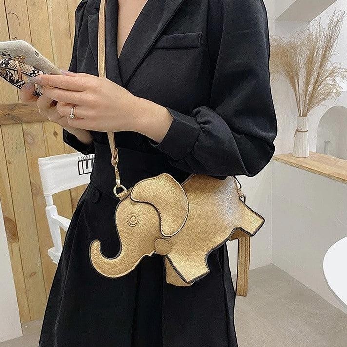 Pordein Elly Mini Bag, a beige elephant-shaped crossbody bag made of PU leather with adjustable strap.