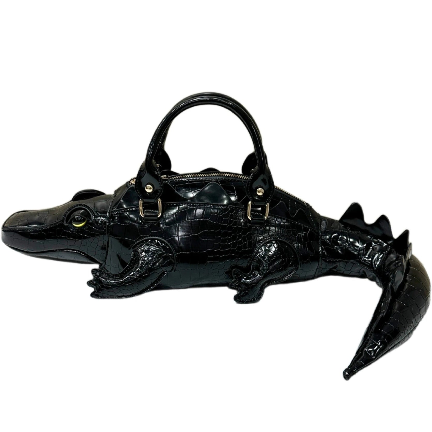 Black alligator-shaped handbag on a white background
