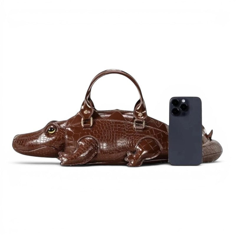 Pordein brown vegan leather alligator shoulder bag with croc-embossed body and tail detail.