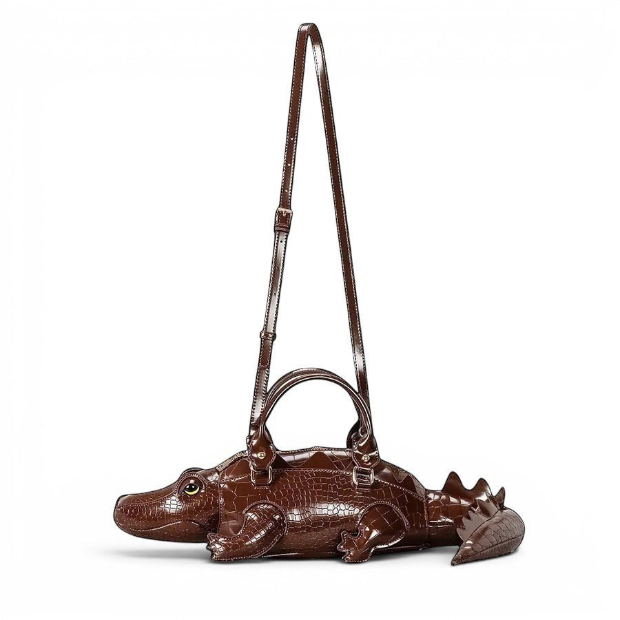 Pordein brown vegan leather alligator shoulder bag with croc-embossed body and tail detail.
