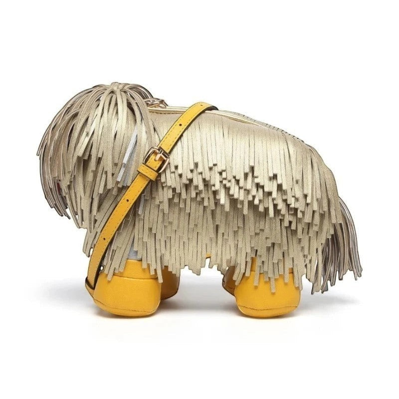 Pordein Cooper Cross Body Bag, a gold metallic vegan leather dog-shaped crossbody with fringe, yellow accents, and adjustable strap.