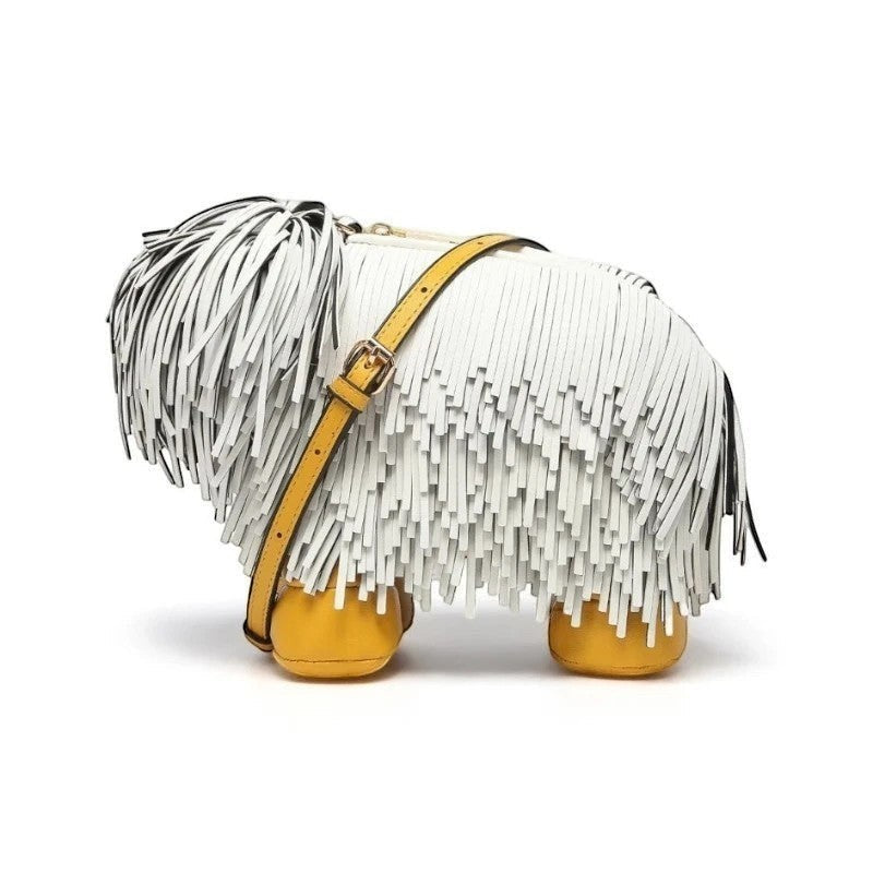 Pordein Cooper Cross Body Bag, white vegan leather with fringe, yellow accents, and gold hardware, shaped like a dog.