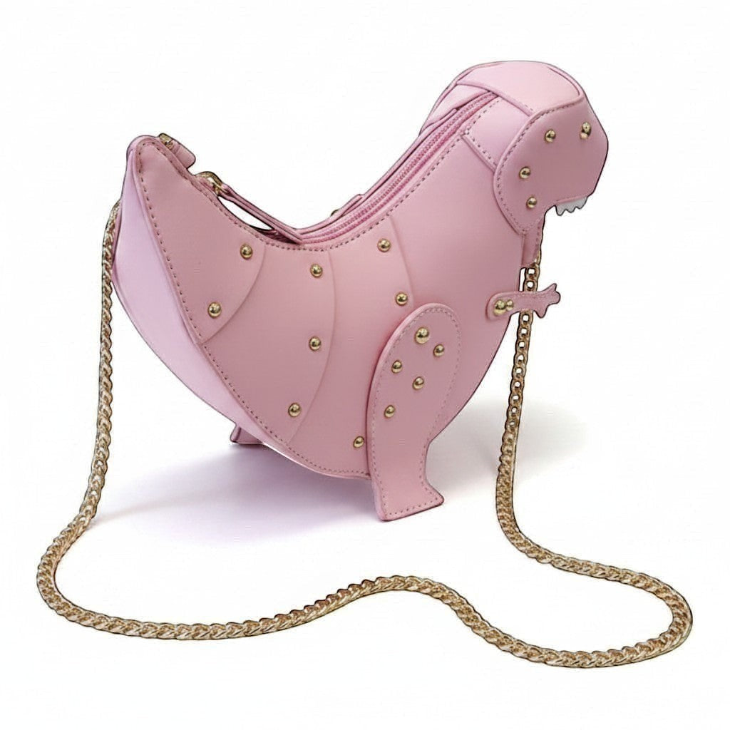 Pordein pink vegan leather dinosaur-shaped mini bag with gold stud details and chain strap.