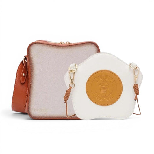 Pordein Eggs & Toast mini bag, a playful shoulder bag shaped like toast with a detachable fried egg coin purse. Made of vegan PU leather.