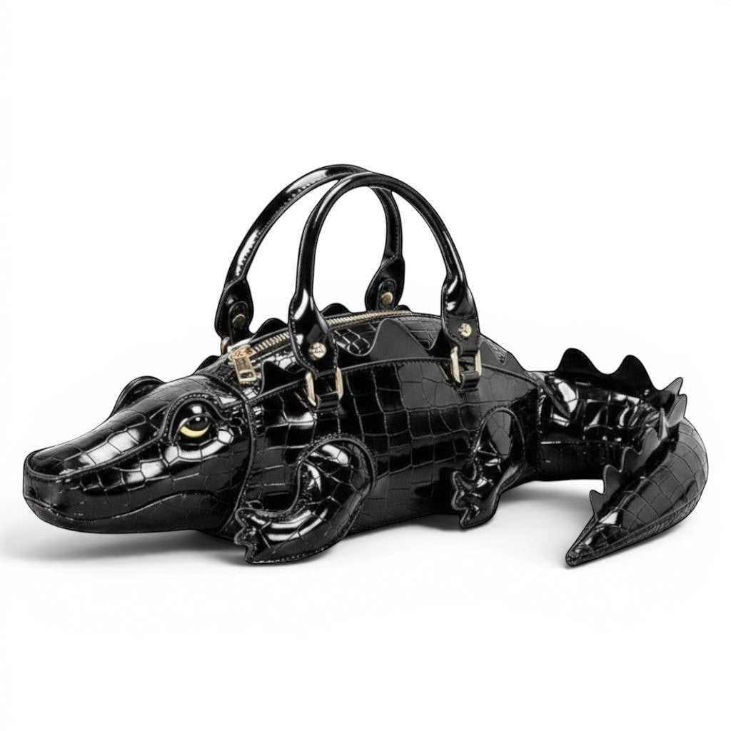 Pordein black crocodile-embossed vegan leather shoulder bag shaped like a gator with gold hardware and dual handles.