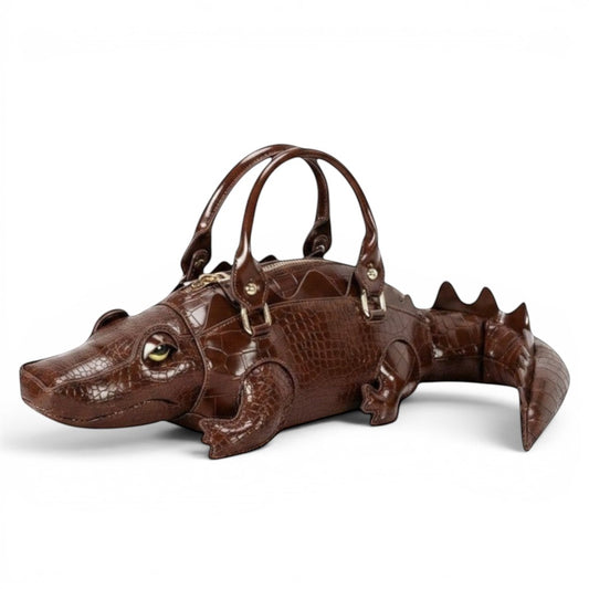 Pordein brown crocodile-embossed vegan leather shoulder bag shaped like a gator with dual top handles and gold-tone hardware.