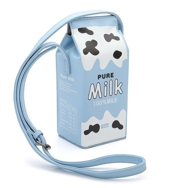 Pordein light blue PU leather mini bag shaped like a milk carton with black cow spots and "Pure Milk 100% Milk" text.