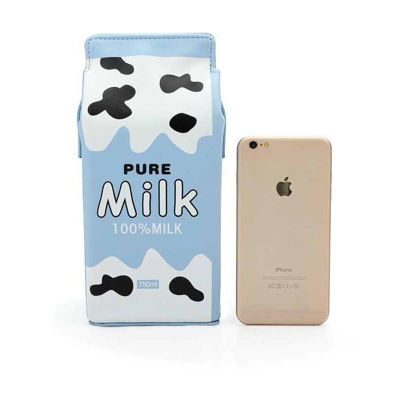 Pordein blue and white PU leather mini bag shaped like a milk carton with cow spots and "Pure Milk 100% Milk" text.