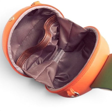 Pordein orange vegan PU leather mini bag with bamboo lining and removable strap, shaped like a fruit.