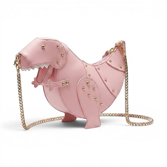 Pordein pink vegan leather Rex Mini Bag shaped like a dinosaur with gold stud details and chain strap.