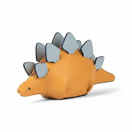 Pordein Stegosaurus Mini Bag in orange vegan leather with light blue plates and a tail.
