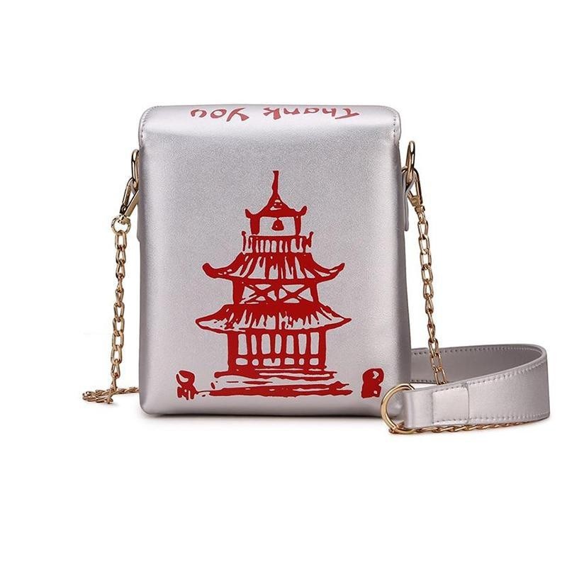 Pordein silver PU leather mini bag shaped like a Chinese takeaway box with red pagoda and text detail.