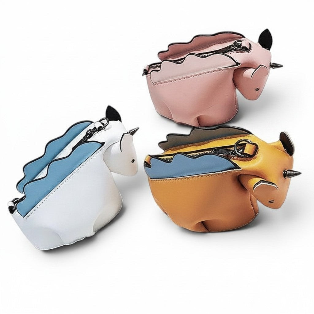 Pordein whimsical unicorn mini bag in pink, white with blue accents, and yellow with blue accents. Made of PU leather.