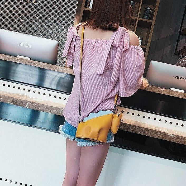 Pordein yellow and light blue PU leather unicorn mini bag with adjustable strap. Whimsical design.